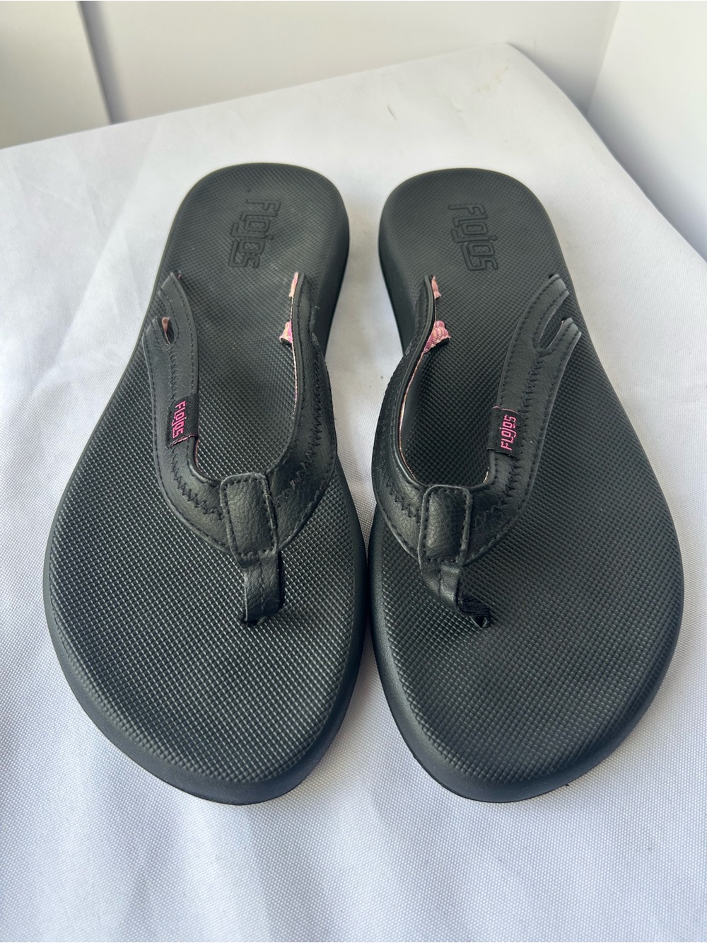 Flojos Black Flip Flop Sandals with Pink Logo Accents